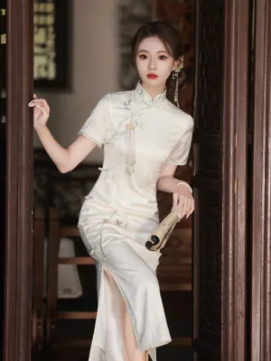 White Cheongsam dress with delicate embroidery, modern Chinese style, elegant summer silhouette